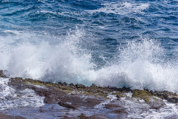 Dramatic Ocean crashing wave Hawaii at Makapu Point