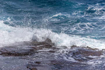 Dramatic Ocean crashing wave Hawaii at Makapu Point
