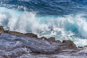 Dramatic Ocean crashing wave Hawaii at Makapu Point