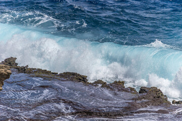 Dramatic Ocean crashing wave Hawaii at Makapu Point