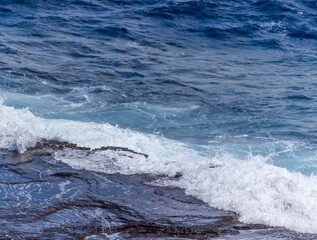 Dramatic Ocean crashing wave Hawaii at Makapu Point