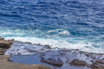 Dramatic Ocean crashing wave Hawaii at Makapu Point
