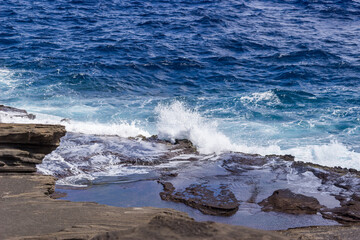 Dramatic Ocean crashing wave Hawaii at Makapu Point