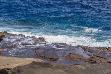 Dramatic Ocean crashing wave Hawaii at Makapu Point