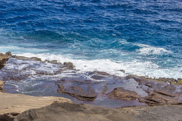 Dramatic Ocean crashing wave Hawaii at Makapu Point