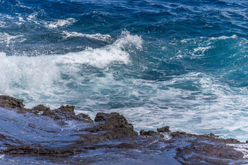 Dramatic Ocean crashing wave Hawaii at Makapu Point