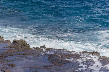 Dramatic Ocean crashing wave Hawaii at Makapu Point