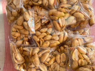 Fried peanuts packaged in plastic are commonly found in food stalls in Indonesia