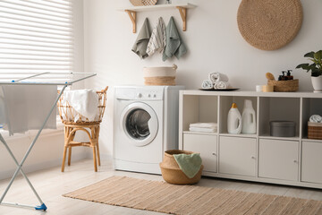 Washing machine, towels and detergents in laundry room