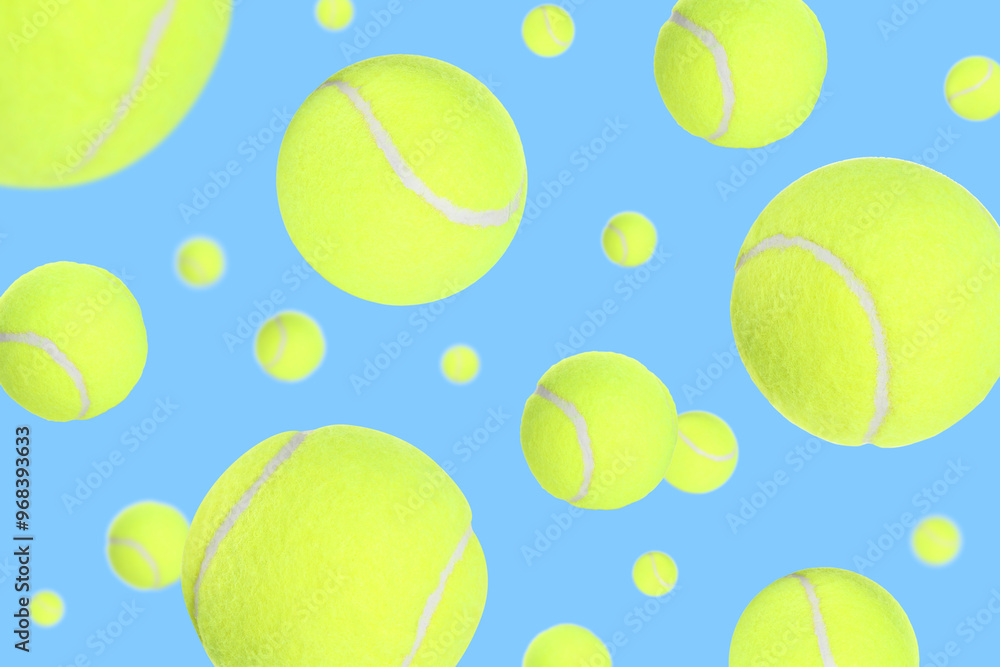 Canvas Prints Bright tennis balls in air on light blue background