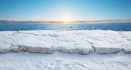 Obraz premium Serene winter landscape with frozen lake and sunset
