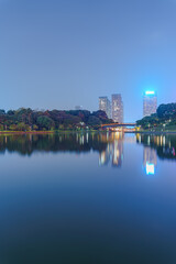 Night view of parks and lakes with high-rise buildings in Foshan city