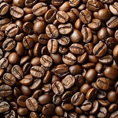 Fototapeta premium Roasted coffee beans background. Close up of roasted coffee beans.
