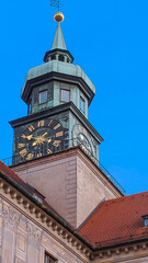 Fototapeta premium The Tower Clock in the Munich Residence is the former royal palace of the Bavarian monarchs of the House of Wittelsbach. It is the largest city palace in Germany. Munich, 2018