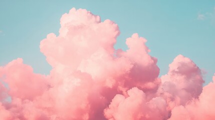 Gentle pink clouds float in the sky as dusk approaches, offering a serene and soothing atmosphere in the evening light