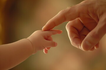 baby touch mom finger
