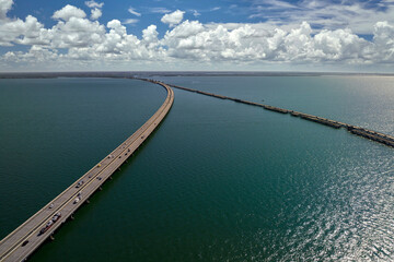 Aerial view of Sunshine Skyway Bridge over Tampa Bay in Florida with moving traffic. Concept of...