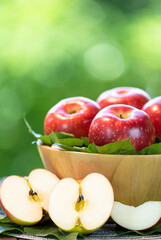 Red Japanese Apple in Wooden tray, Shinano Red and Sansa  Apple on wooden background. 