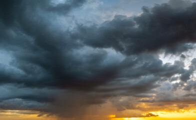Heavy rainfall during summer thunderstorm in Florida at sunset