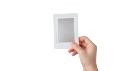 Hand holding instant photo card on transparent background