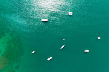 Tropical sea surface seascape with travel boats,Summer sea landscape background Top view