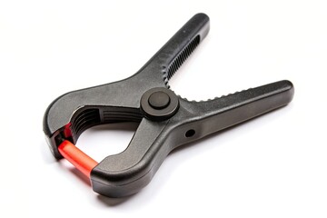 Obraz premium workshop, object, tool, handyman, construction, hardware, DIY, photography,black, spring clamp, clamp, white background, plastic, Black plastic spring clamp isolated over white background