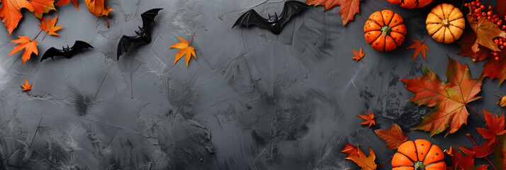 autumnal Halloween background with pumpkins and bats, autumn leaves