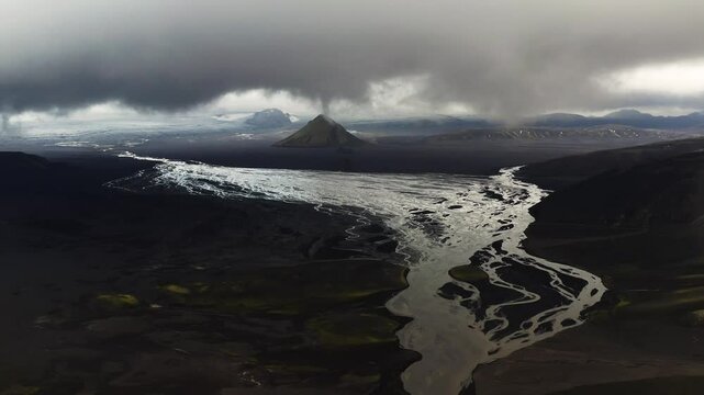 Dark Clouds Over Maelifell Volcano And Malifellssandur River In Southern Iceland. aerial shot