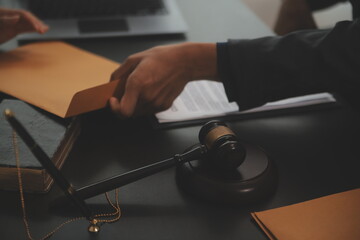 Law theme, gavel or mallet of the judge, lawyer enforcement officers, evidence-based cases taken into account in the court abount business, legislation.