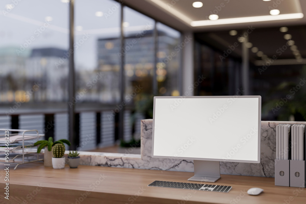 Aufkleber a computer with a white screen mockup sits on a reception counter in a modern skyscraper office.