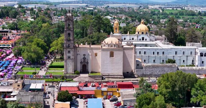 Horizontal drone sweep shot of the south facade of the National Museum of the Viceroyalty in the magical town of Tepotzotlan, State of Mexico