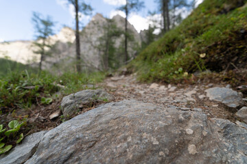stone on the trail in the mountains as display podium 