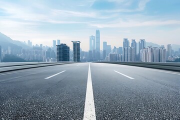 Fototapeta premium A empty road with a city in the background