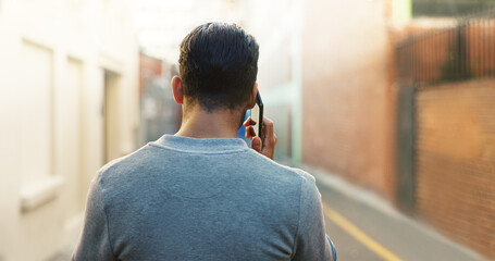 Back, phone call and man talking in city outdoor for communication, news update or negotiation....