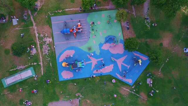 Aerial view a playground with a blue.