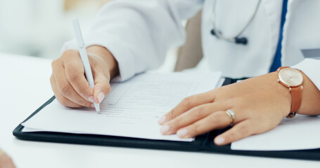 Woman, doctor and hands with documents for prescription, diagnosis or health insurance at hospital. Closeup, female person or medical employee writing or taking notes for healthcare contract or form