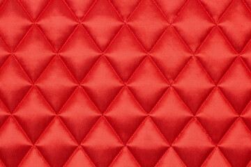 Quilted fabric. The texture of the blanket.