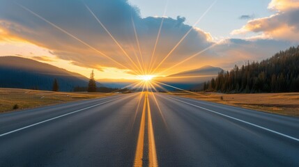 Naklejka premium A breathtaking sunrise over an open road with vibrant colors illuminating the sky and landscape, perfect for travel themes.