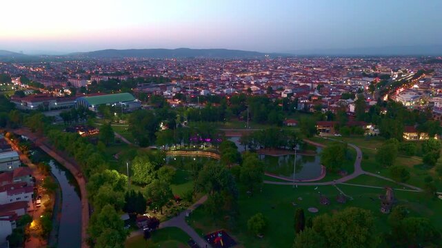 Aerial view a park with a river.
