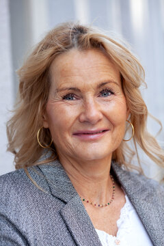 Close-up portrait of smiling mature woman