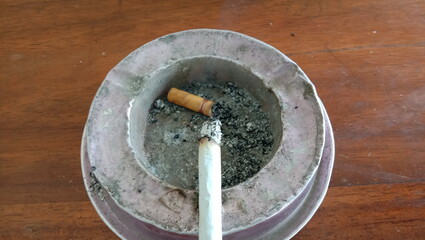 cigarette and ashtray