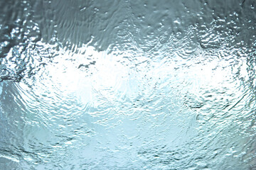 Car glass at a car wash. Abstract background