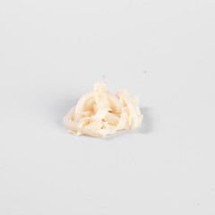 Close-up of a portion of fresh squid on a white background, showcasing its texture and color in a...