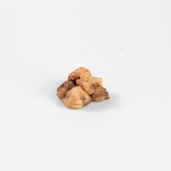 Close-up of roasted mushroom cluster on a white background, showcasing texture and detail, ideal for culinary or ingredient stock photos.