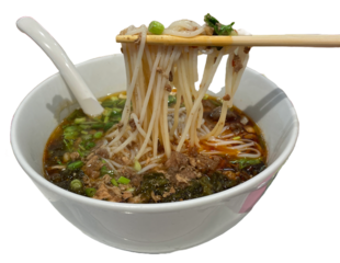 Chinese or Japanese rice noodle in herbal red soup with chopsticks twirl