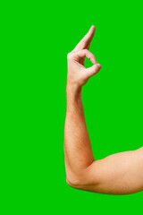 Hand Gesture Signifying Approval Against Bright Green Background