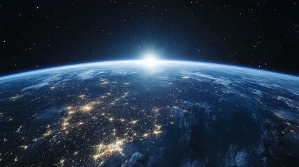 Obraz premium A stunning view of Earth from space, showcasing cities illuminated at night and a sunrise.