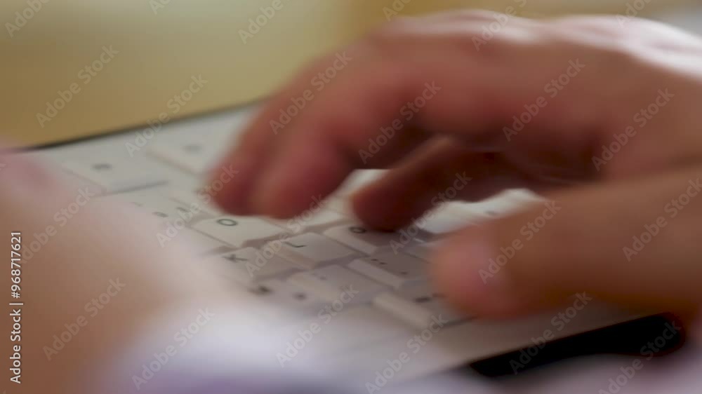 Poster hands typing on a keyboard in a close-up shot