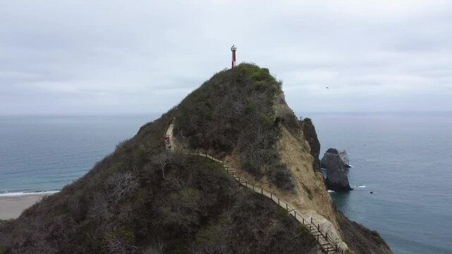 Lighthouse on a cliff hill, Manabi Ecuador, seaside beach coastline, aerial