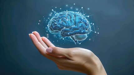 A hand is holding a brain